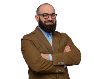 happy-confident-bearded-man-brown-suit-wearing-glasses-looking-camera-smiling-cheerfully-with-arms-crossed-standing-purple-background-removebg-preview
